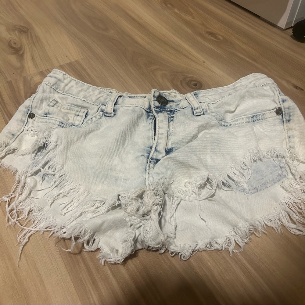 Distressed denim shorts